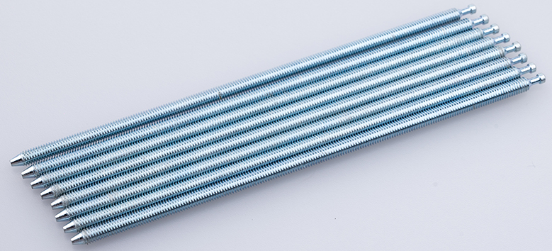A row of long fully threaded rods