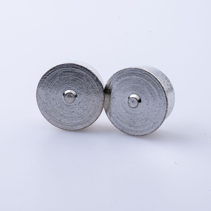 Two round tin-plated brass nuts with a flange